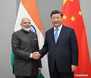 Indian Prime Minister Narendra Modi and Xi Jinping, Indian Prime Minister Narendra Modi and Chinese President Xi Jinping at a bilateral meeting, emphasizing dialogue and cooperation between the two nations.